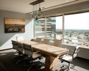 An empty conference room in a tall office building.