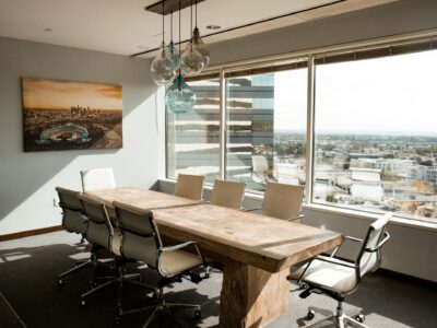 An empty conference room in a tall office building.