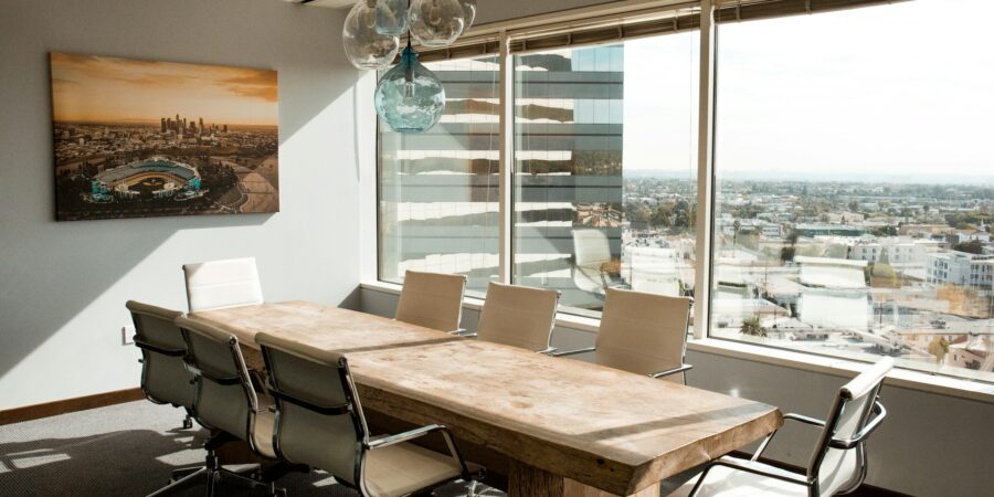 An empty conference room in a tall office building.